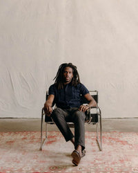 The Button Down Polo in Dark Navy Stripe