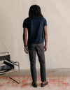 The Button Down Polo in Dark Navy Stripe